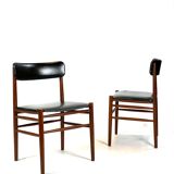 Two dining room chairs in teak and upholstered with black leather of Danish design, 1960s