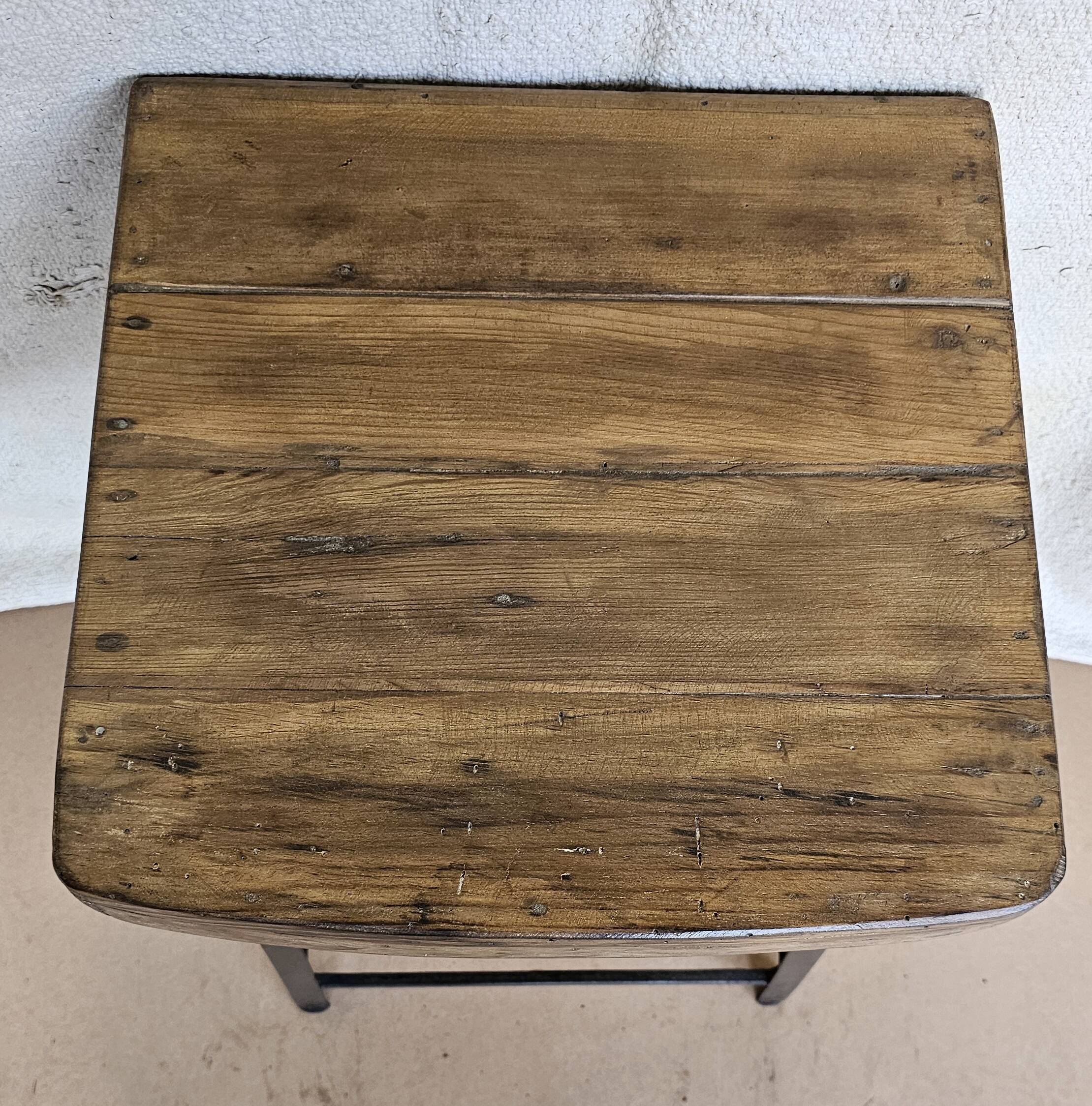 Old workshop stool in wood + wrought iron