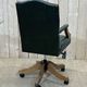 English chesterfield office armchair in green leather from the 1980s