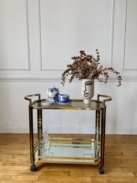 Gold metal dessert and smoked glass