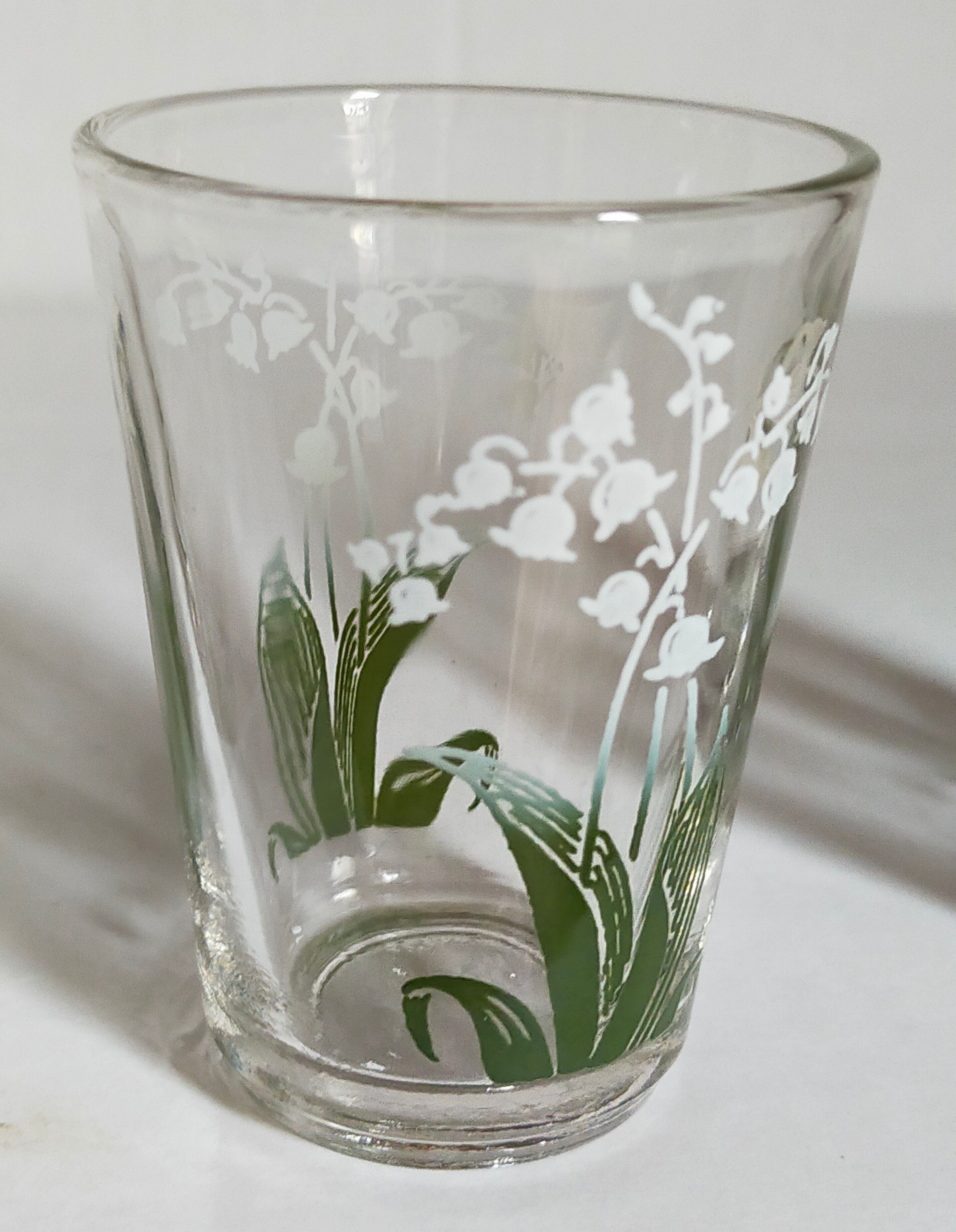 Seven glasses with digestive screen-printed with thrush, 30s