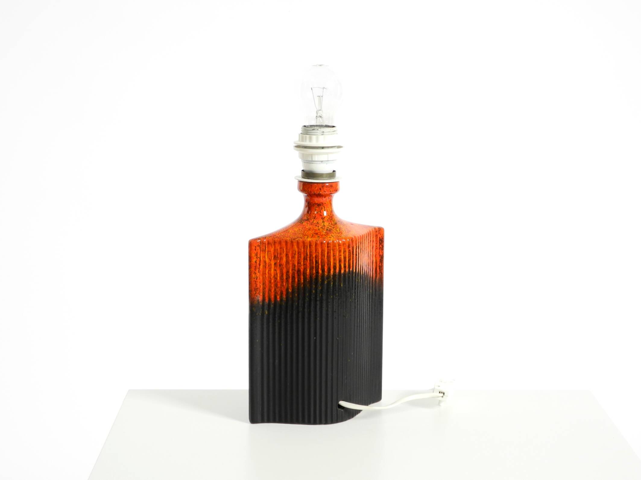 Unique 1960s ceramic table lamp in red and black by Kaiser Leuchten
