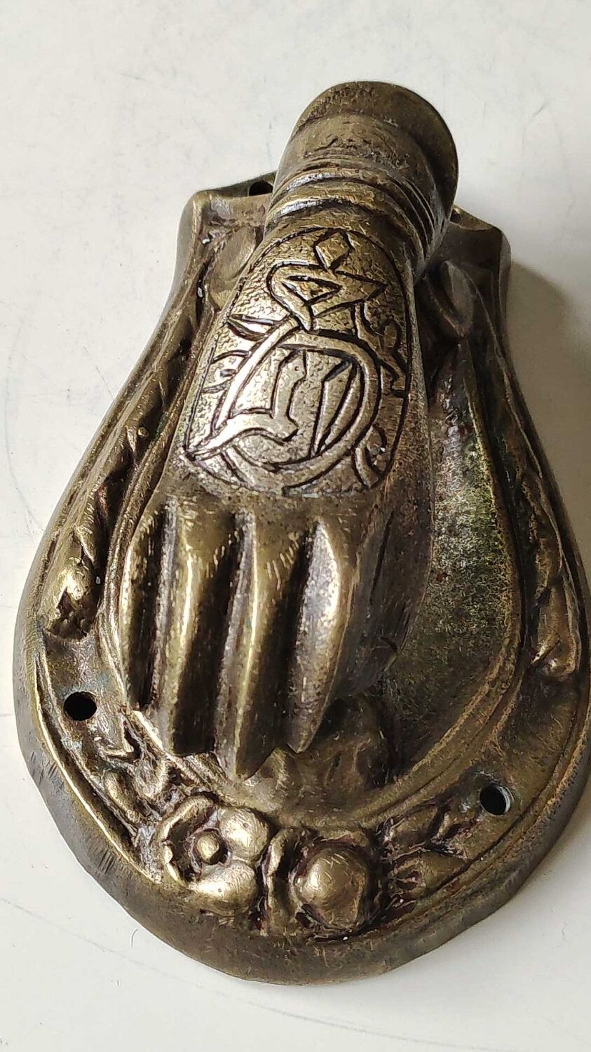 Door knocker in bronze