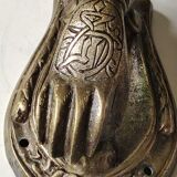 Door knocker in bronze