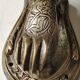 Door knocker in bronze