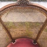 Louis XV style walnut and cane armchair