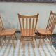 Set of 6 western bistro chairs, including 2 with armrests.
