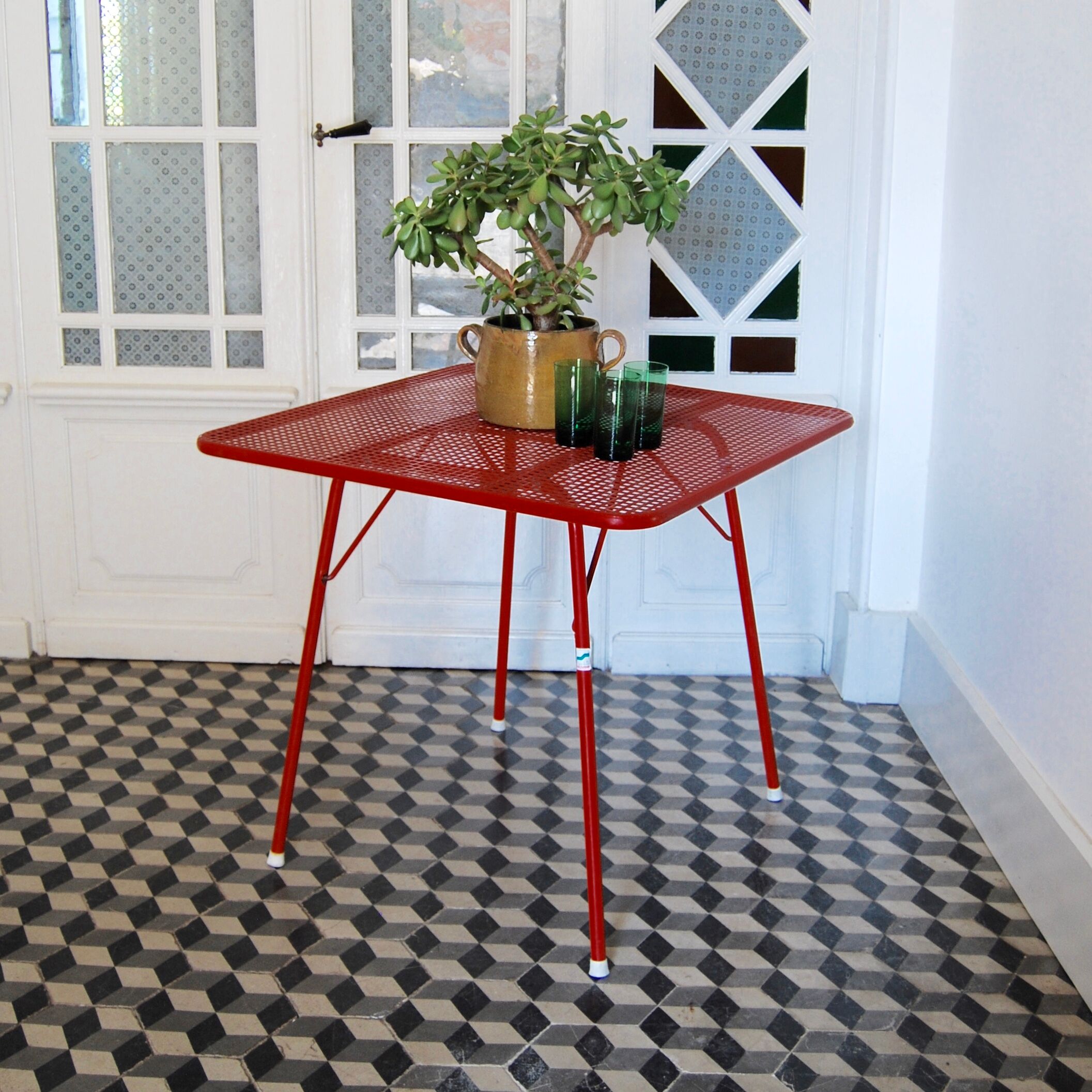 Red metal folding table Malaval type