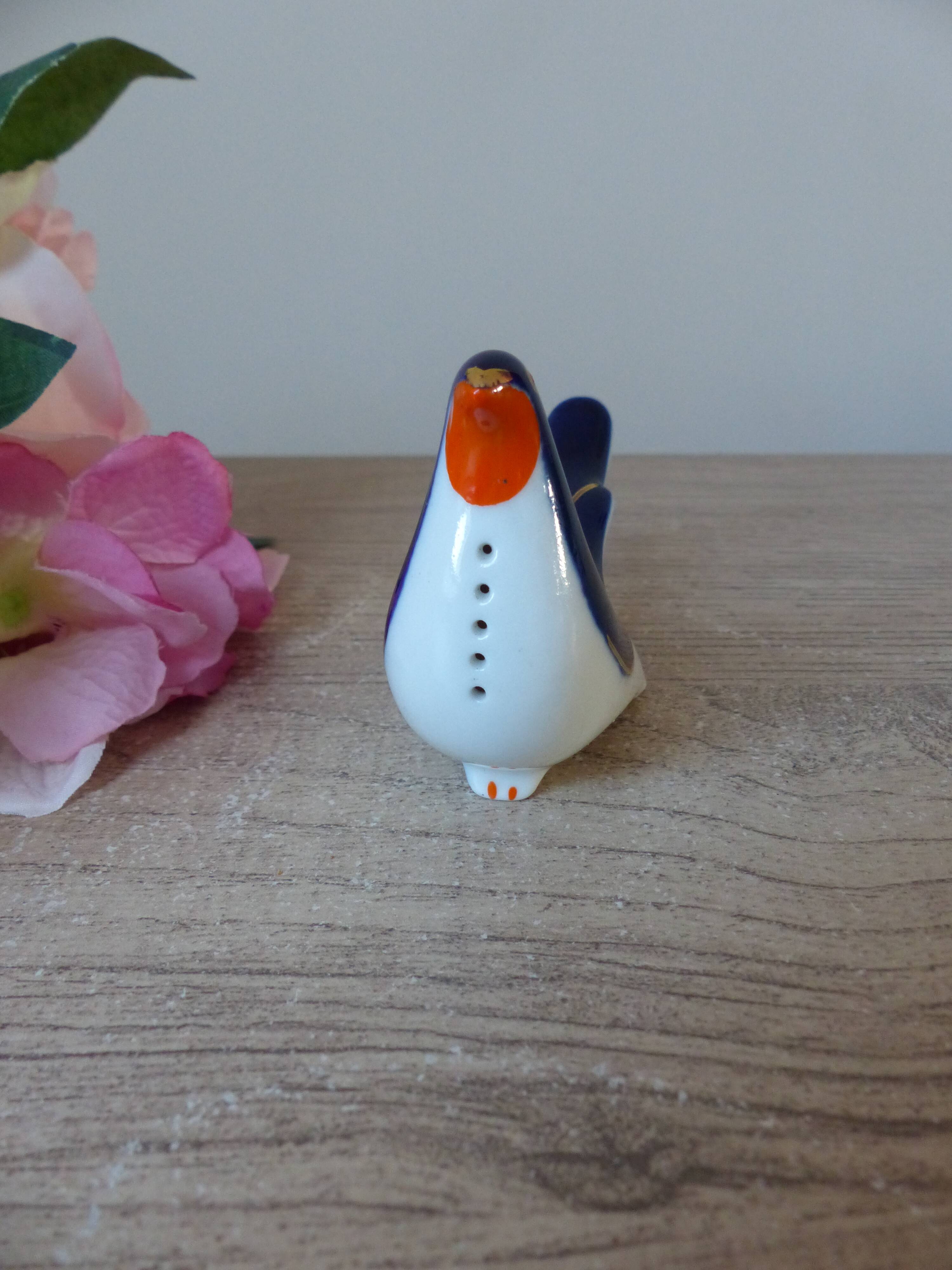 Vintage Soviet salt and pepper shaker in the shape of a cobalt blue bird.