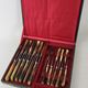 Service 20 couteaux de table lame acier manche corne
