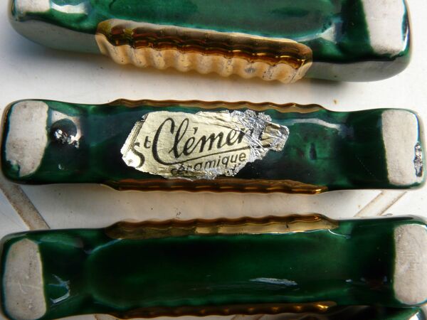 Ensemble repose-plat, dessous de bouteilles et porte-couteaux Art Déco