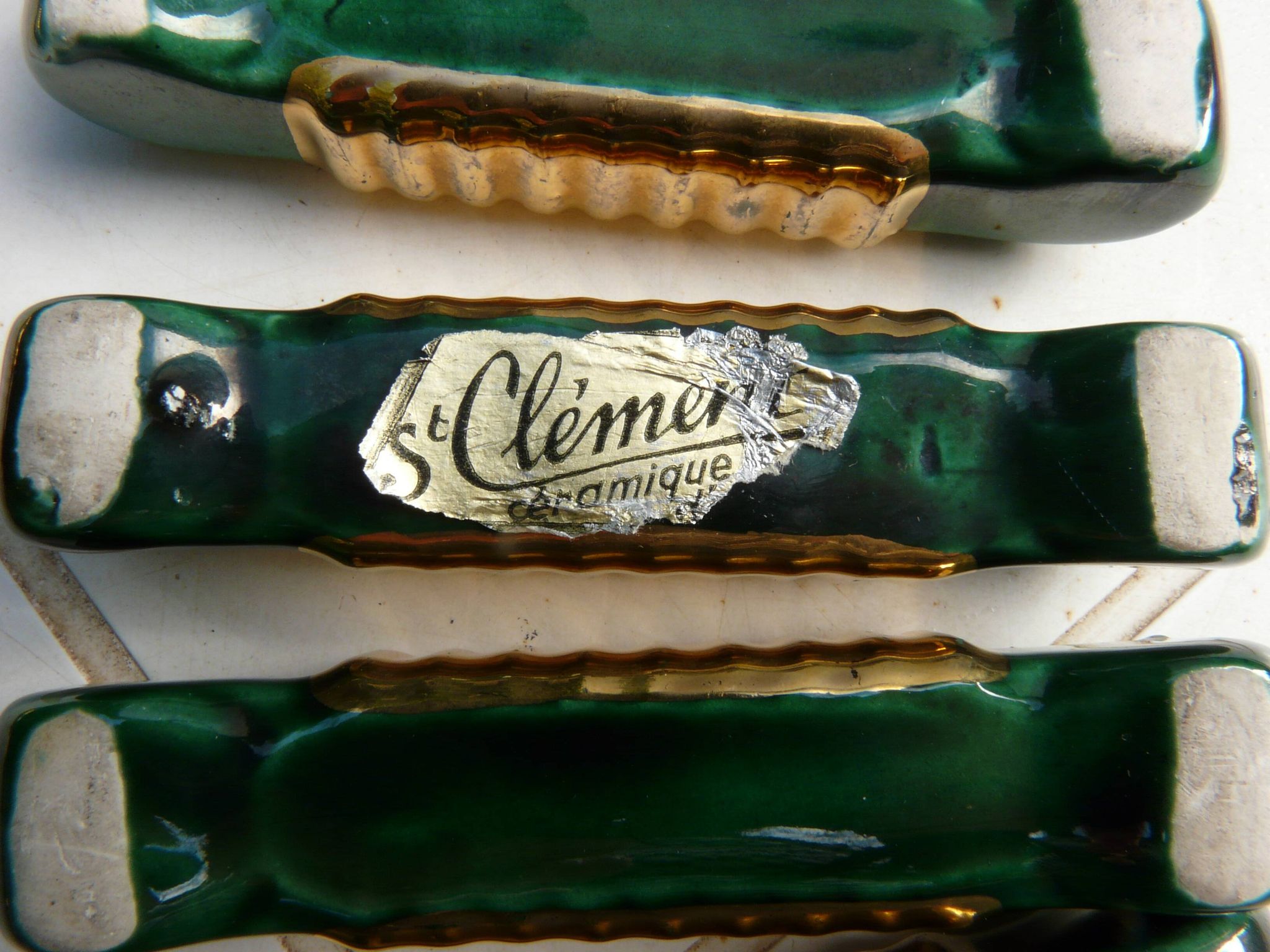 Ensemble repose-plat, dessous de bouteilles et porte-couteaux Art Déco