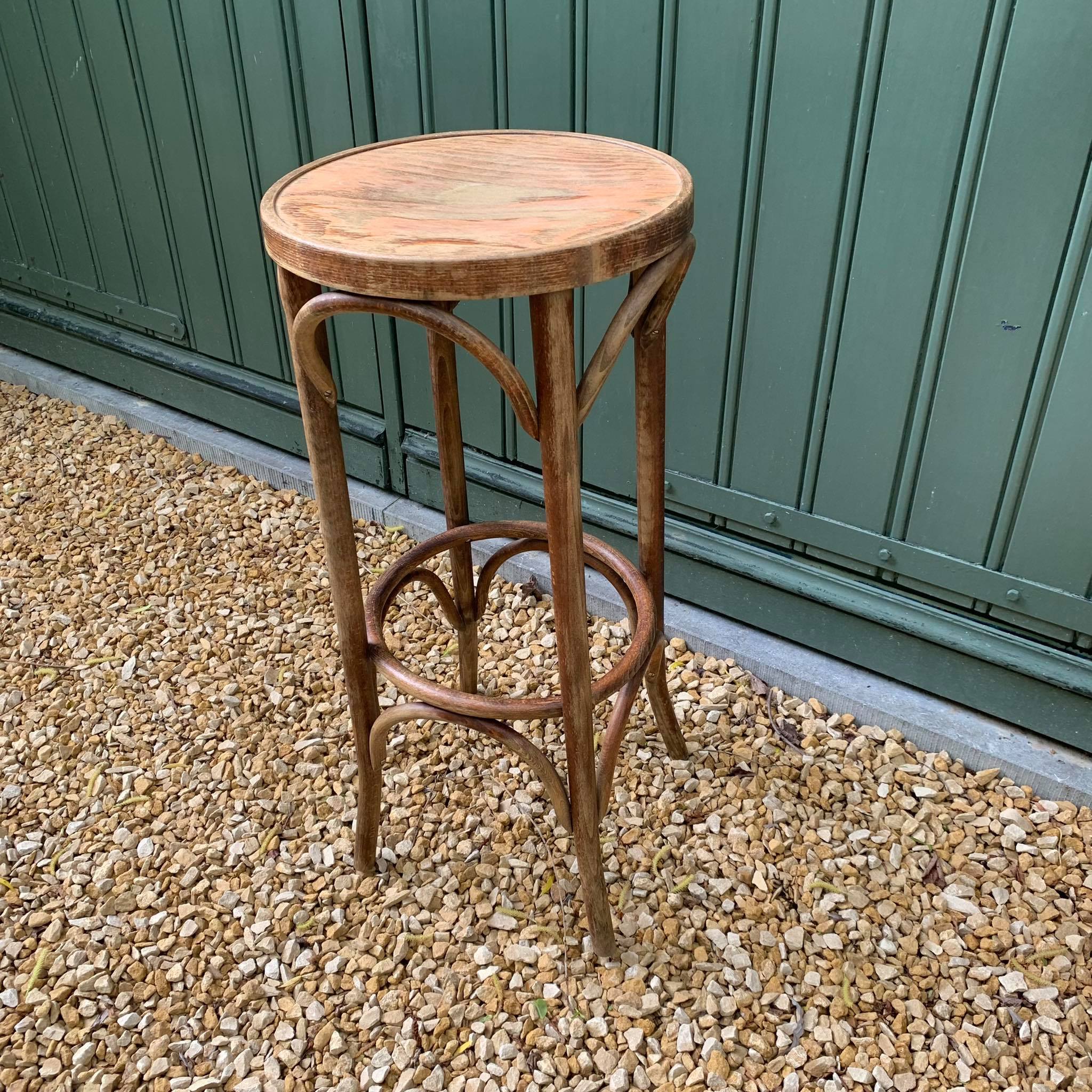 Curved wooden bistro stool