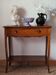 Louis XV style console in cherry wood, 20th century.