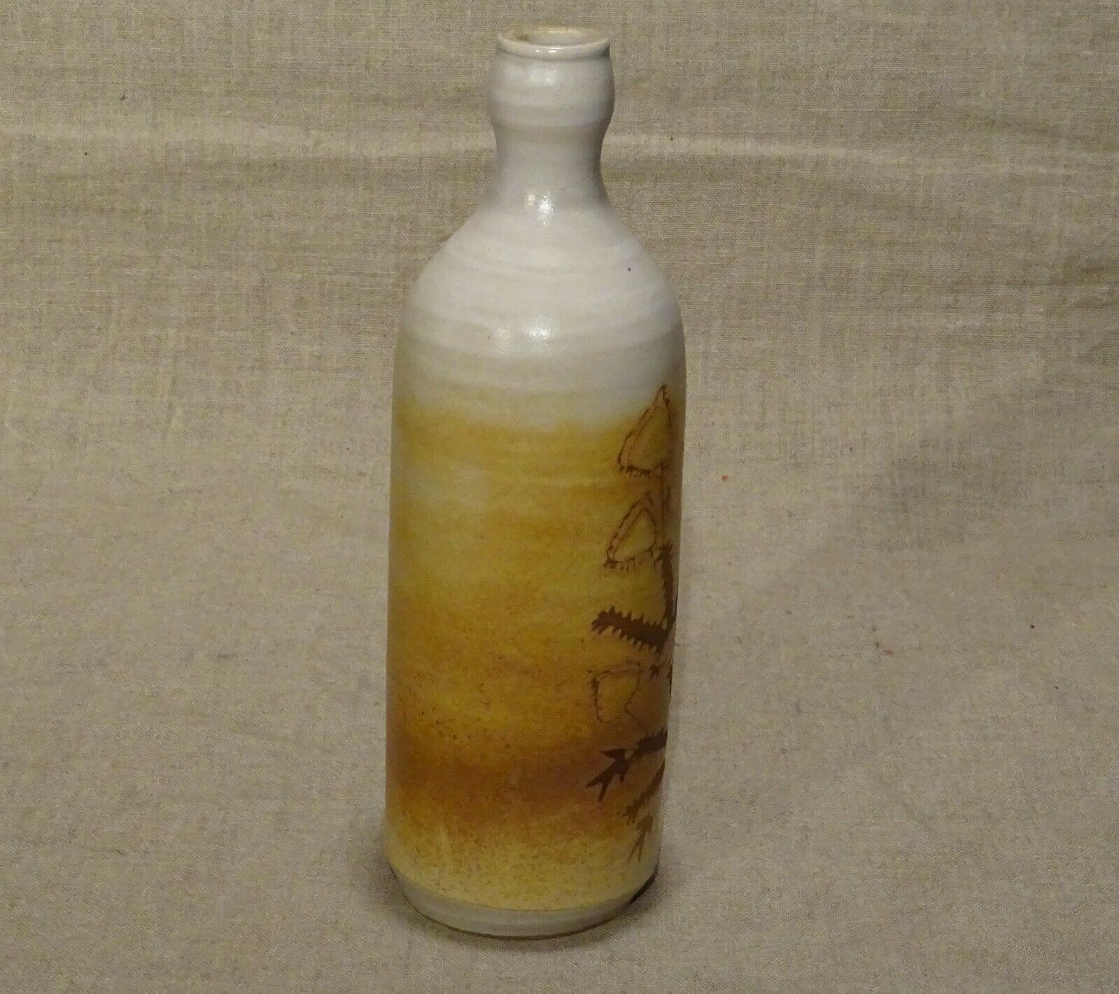 Bottle decorated with Vallauris foliage