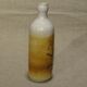 Bottle decorated with Vallauris foliage