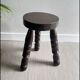 Wooden tripod stool