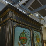 Buffet a deux corps en poirier noirci napoléon Décor de montgolfières