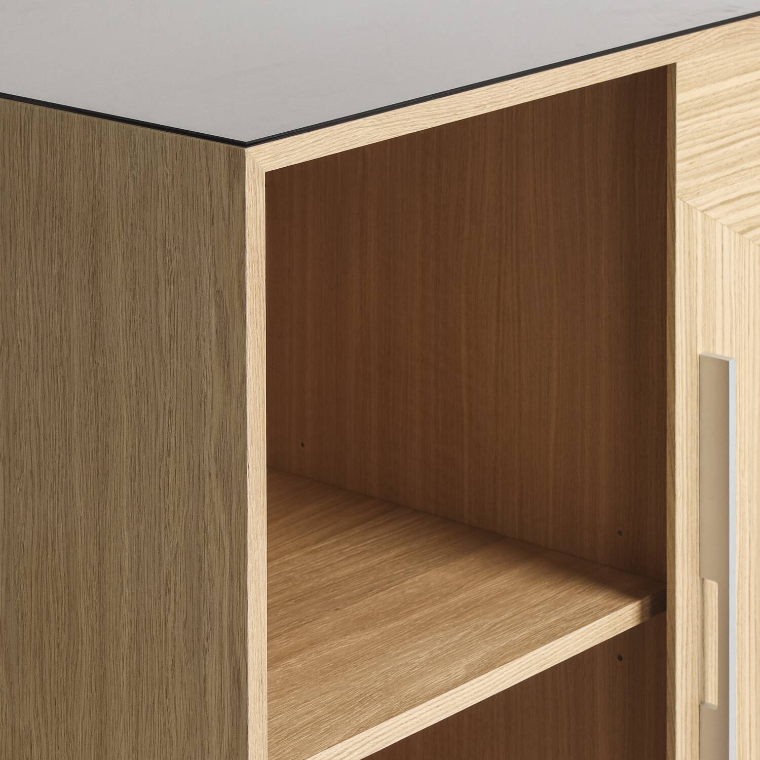 Custom-made oak bar buffet with a smoked glass top