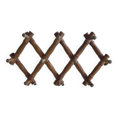 Old wooden wall coat rack