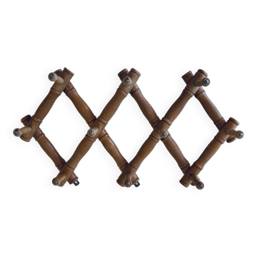 Old wooden wall coat rack