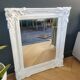 Antique mirror with painted wooden frame