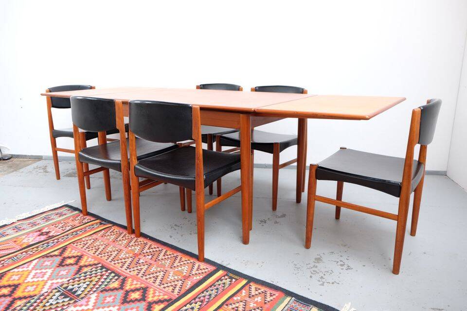 Teak dining table in retro vintage Danish style from the 60s-70s.