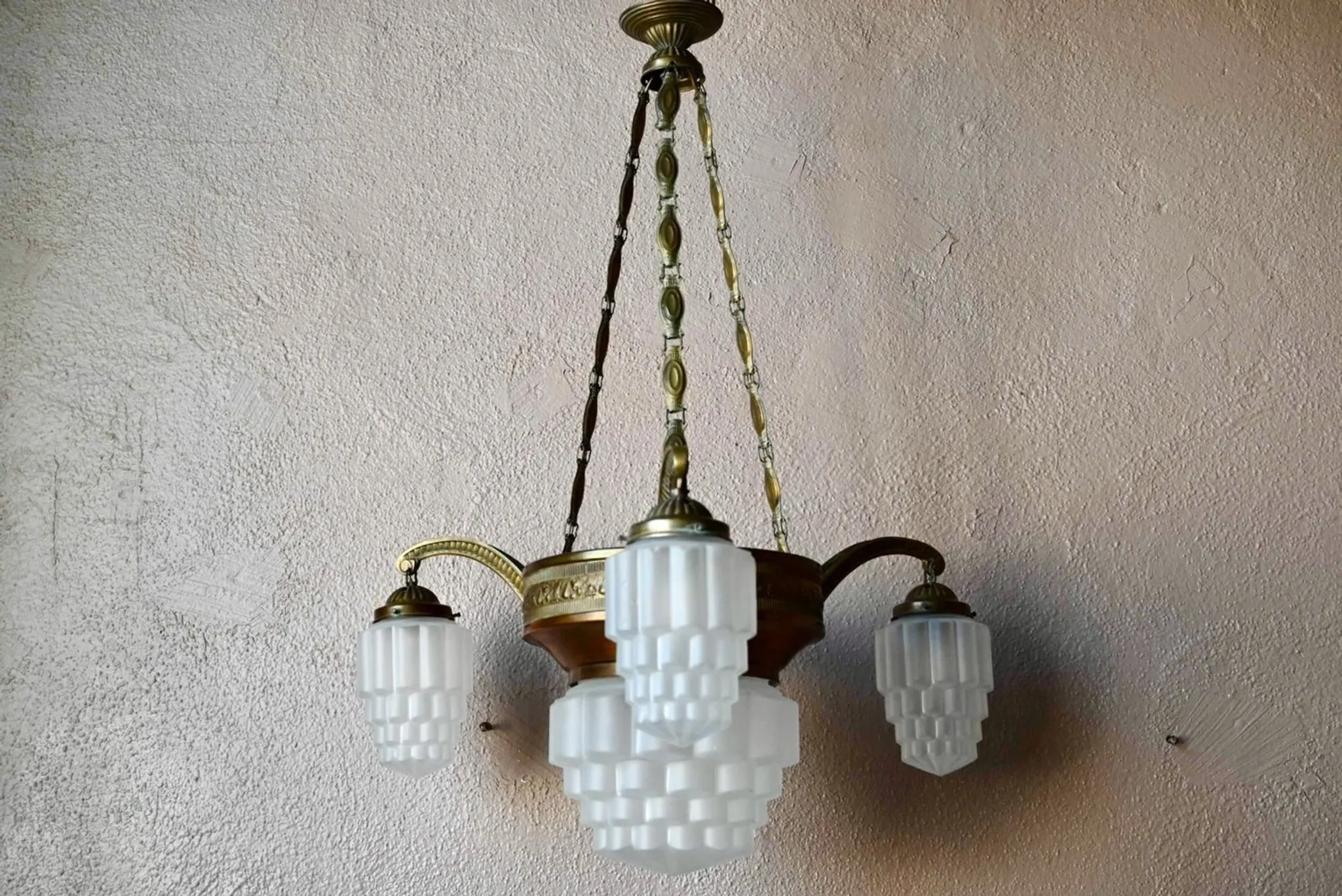 Art Deco lustre in brass and frosted pressed glass from the 1930s.
