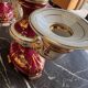 Pair of Limoges porcelain candlesticks with hand-decorated decoration – red and gold