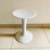 Stool with iconic design and tulip base, published by Tatay.