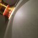 Large hanging lamp, made of brass-coloured aluminium with red and white contrast lacquer inside.