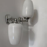 Chrome and opaline wall lights from the 70s.