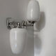 Chrome and opaline wall lights from the 70s.