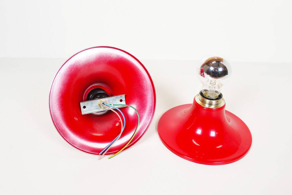 Pair of petite red disc sconces, Italy 1980s