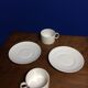 Pair of white porcelain cups and saucers