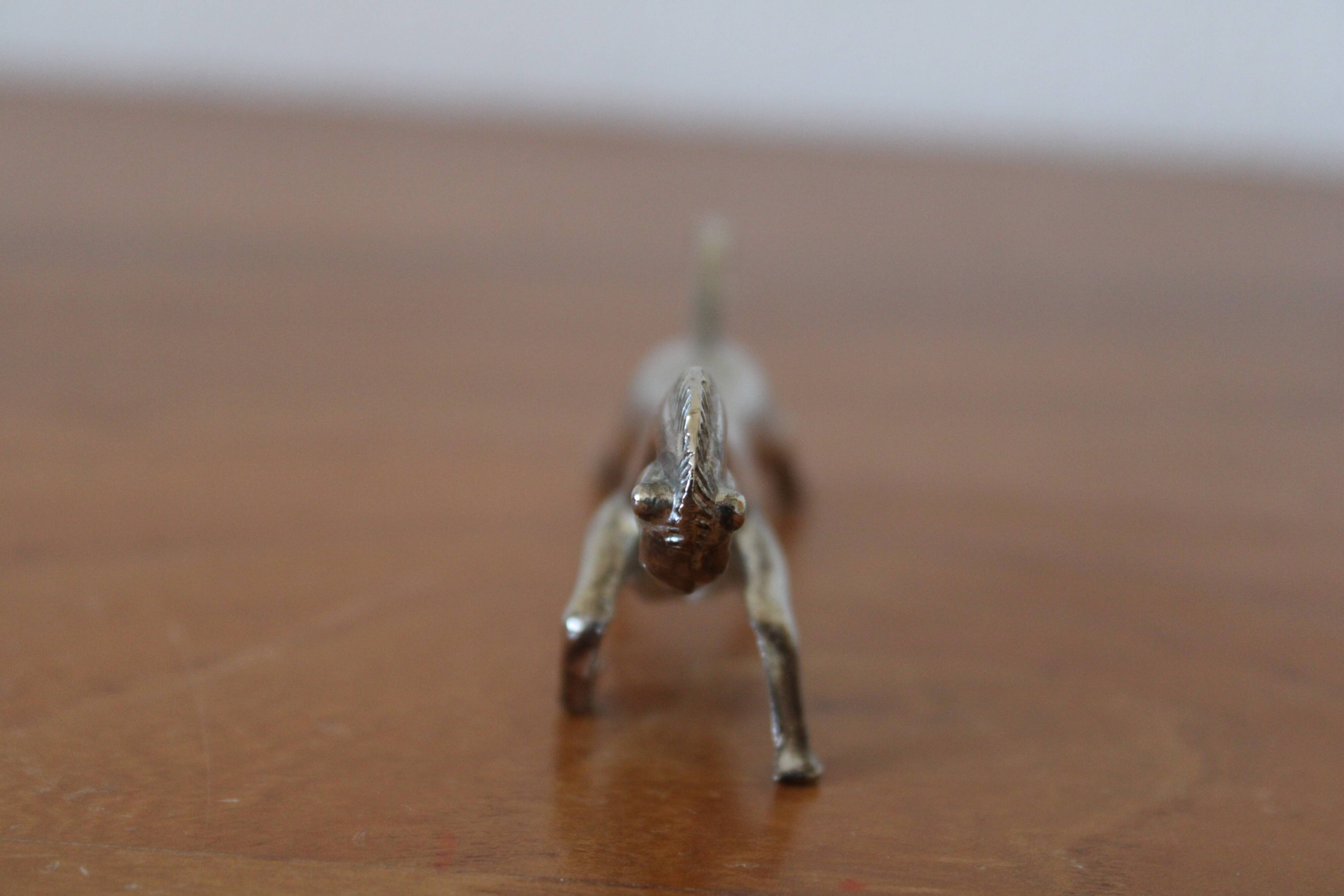 Set of 12 vintage knife rests, in silver metal