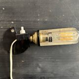 Old black metal and brass wall light, adjustable, 1930s.