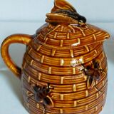 Set of old teapots and honey pot