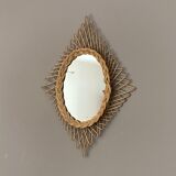 Sun mirror in woven rattan. 1960. Diamond.