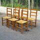 Set of 6 brutalist style chairs in solid pine and woven straw from the 1970s.