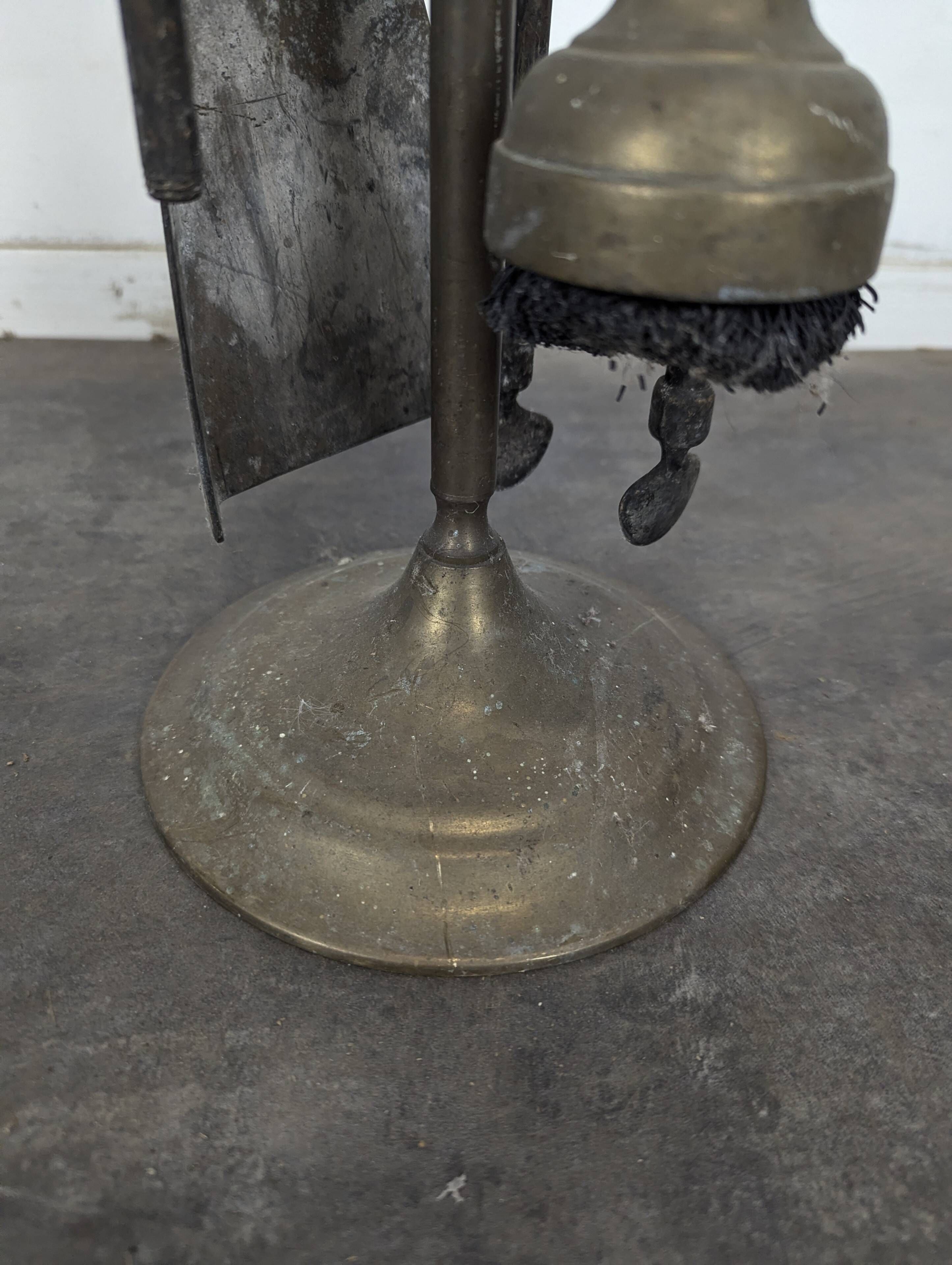 Brass fireplace tool set with four accessories