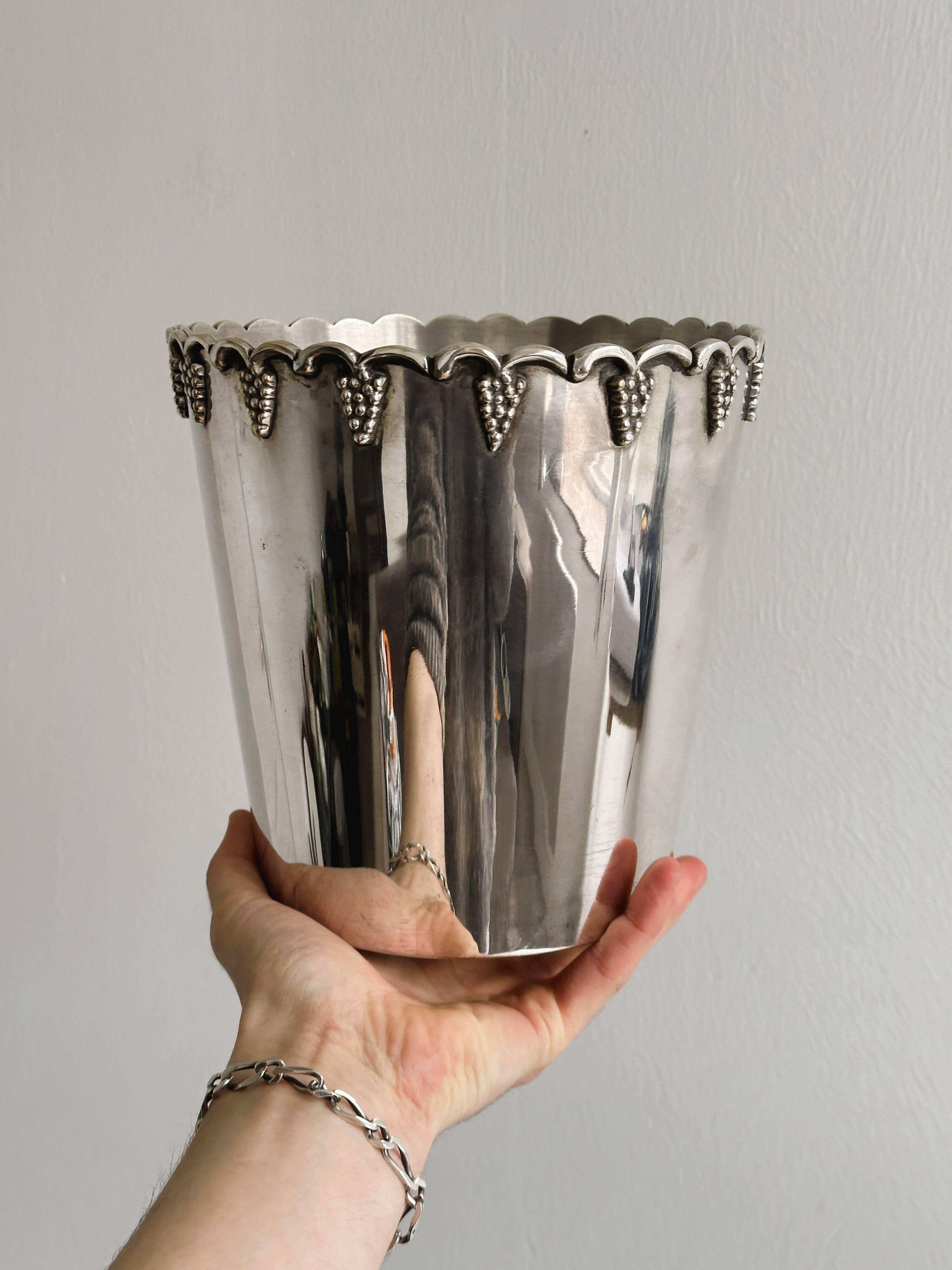 Antique champagne bucket in shiny silver metal