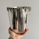 Antique champagne bucket in shiny silver metal