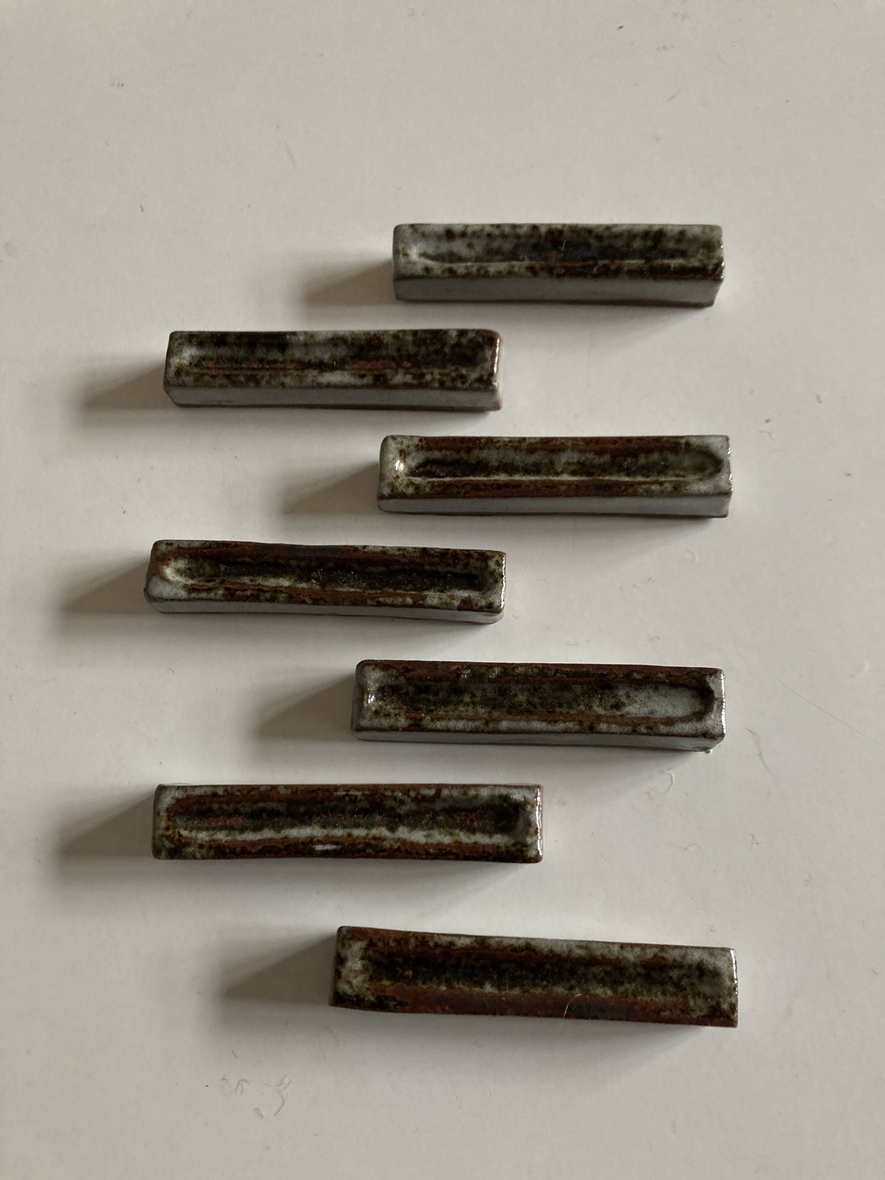Set of 7 modernist pyrite stoneware potter's knife holders 1970