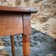 French vintage side table in cherry wood with a drawer.