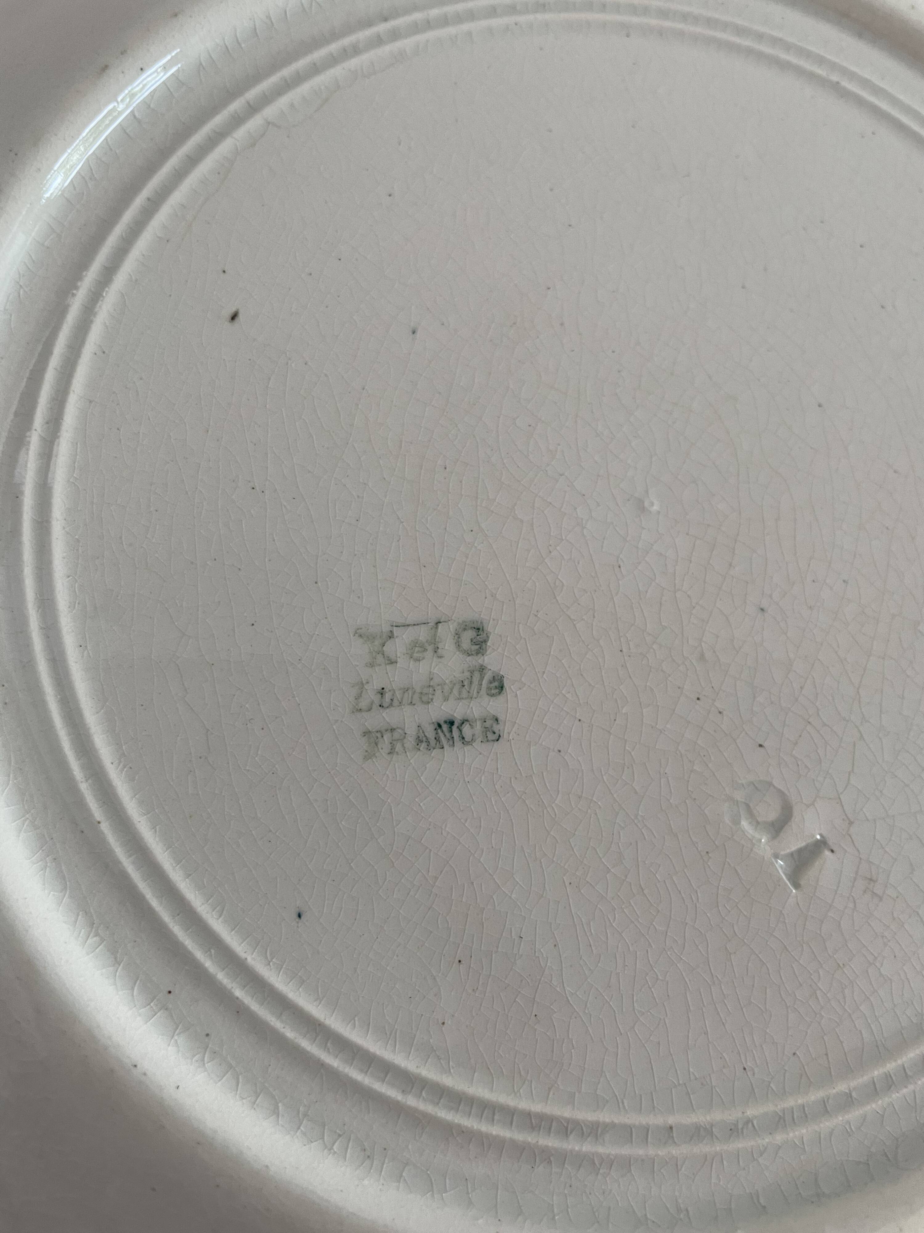 Set of 10 Lunéville ironstone soup plates, Oeillet model