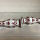 Pair of hexagonal burgundy candlesticks