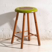 Antique wooden stool with a round seat – Central Europe, circa 1950