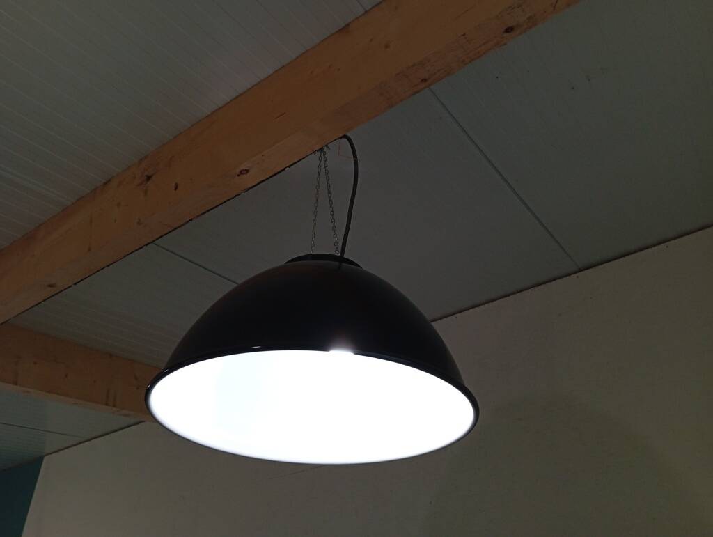 Set of 10 large industrial enamelled metal pendants.