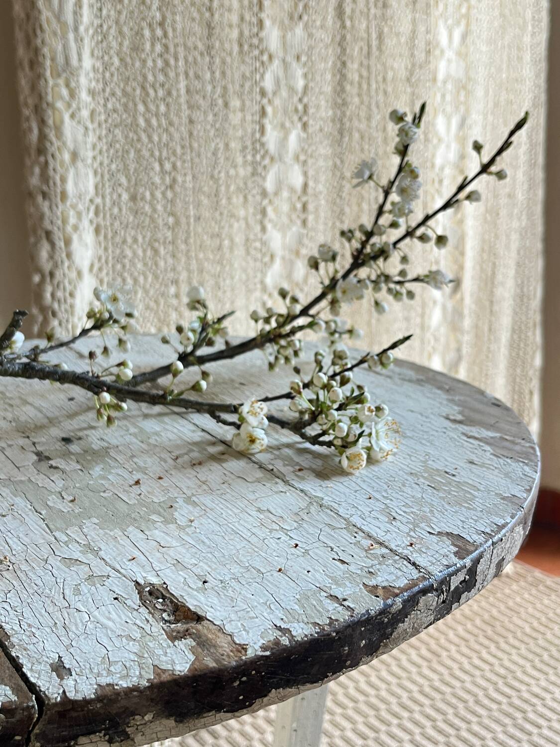 Small side table with an antique finish